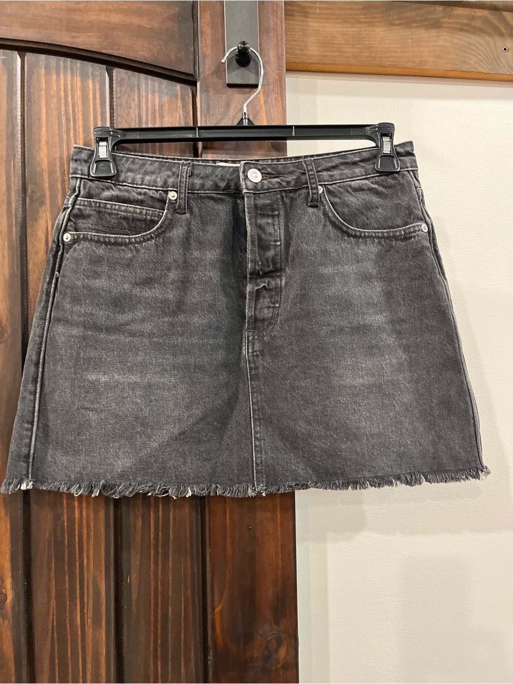 We the Free black denim button fly skirt size 29 distressed
